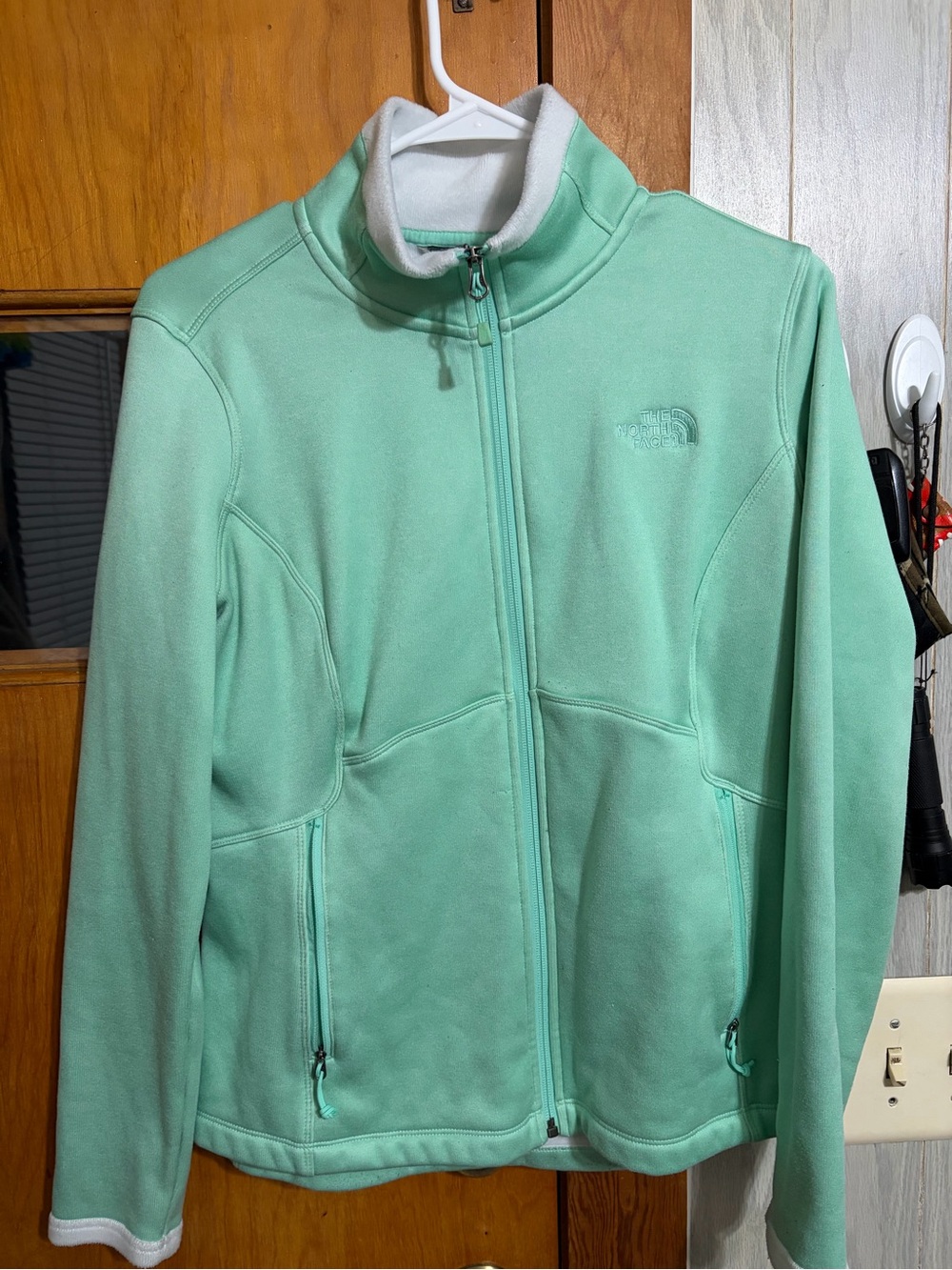 The North Face Womenโs Mint Green Full-Zip Teddy Fleece Jacket